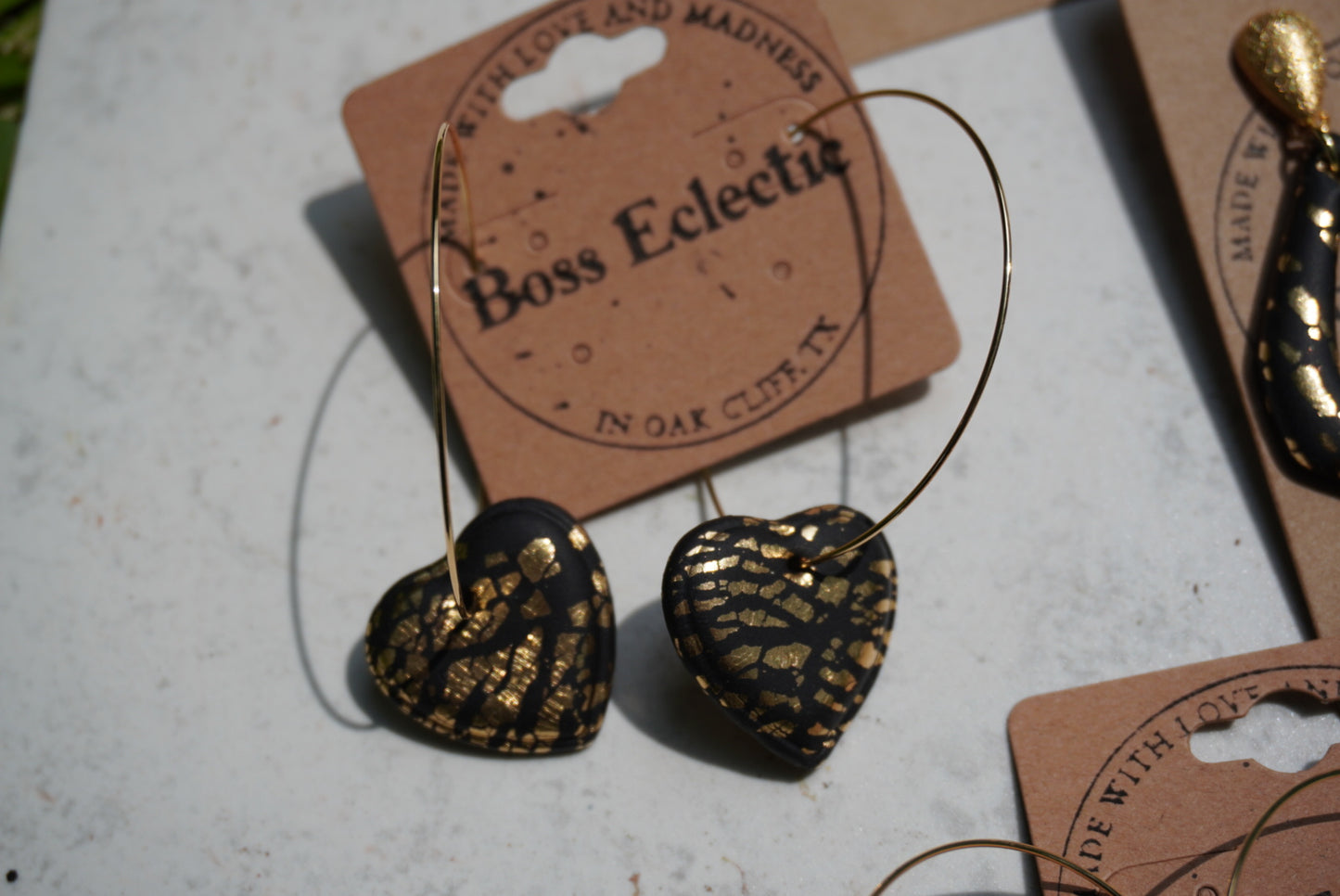 Black and gold heart hoops